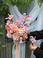 Pink and peach bridal bouquet with anthurium and calla lilies