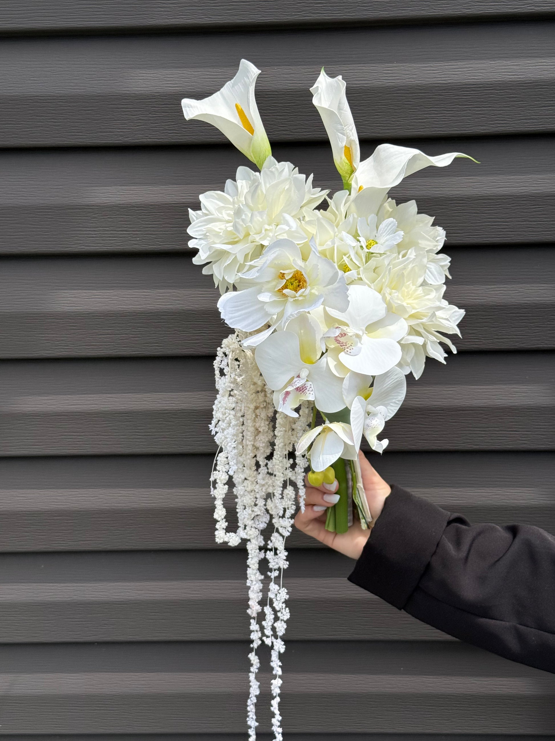 White hydrangeas, dahlias, hanging amaranthus and orchid modern wedding 