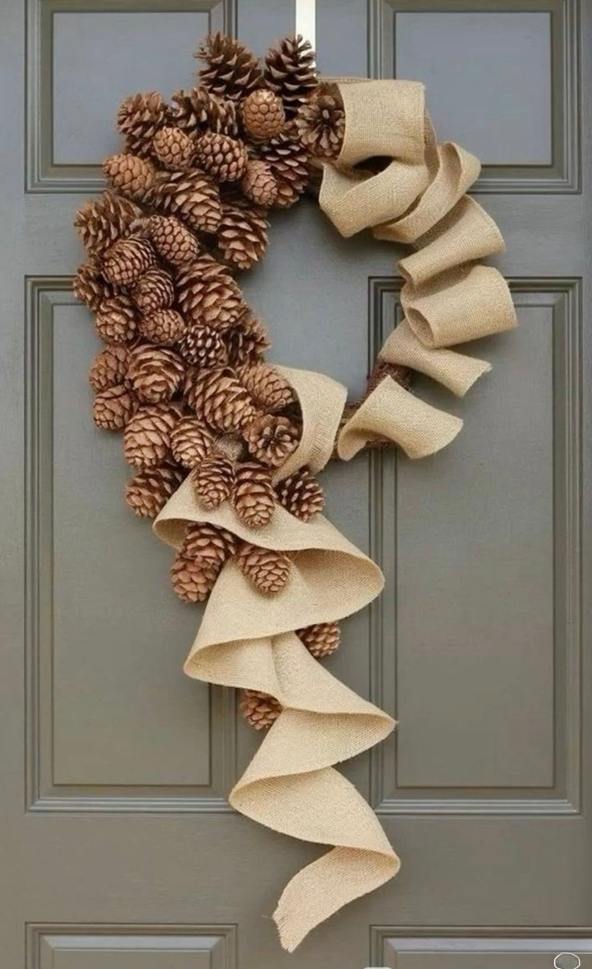 Christmas Wreath with pine cones and ribbons